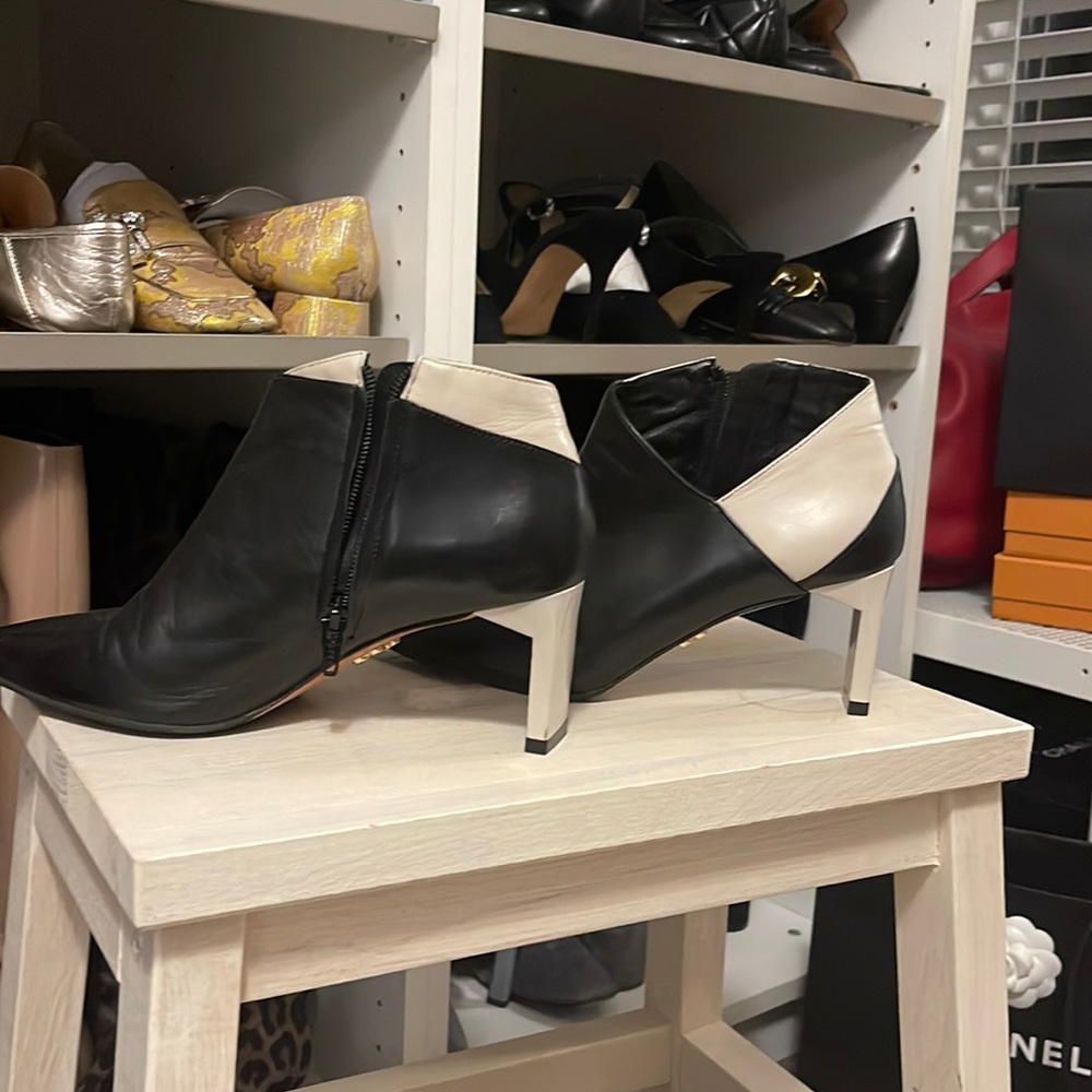 Black leather booties with Cream leather heel